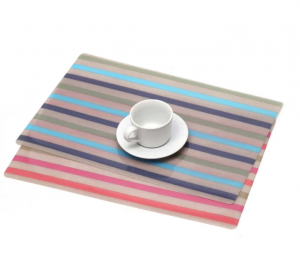 Features recycled rainbow striped PVC rectangular woven table placemats
